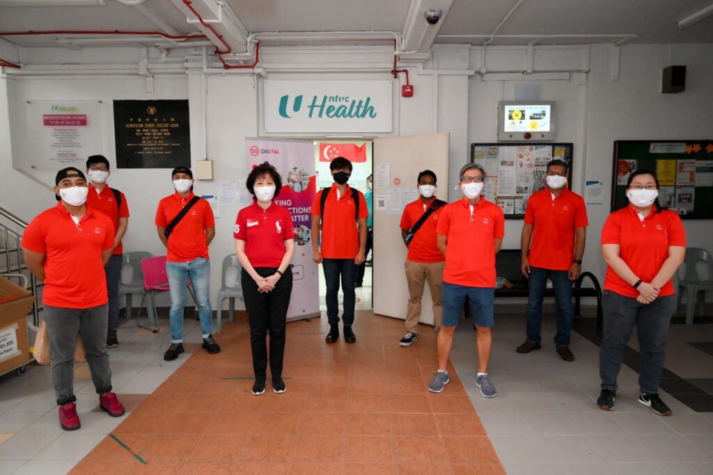 Sister Mary Liew with volunteers