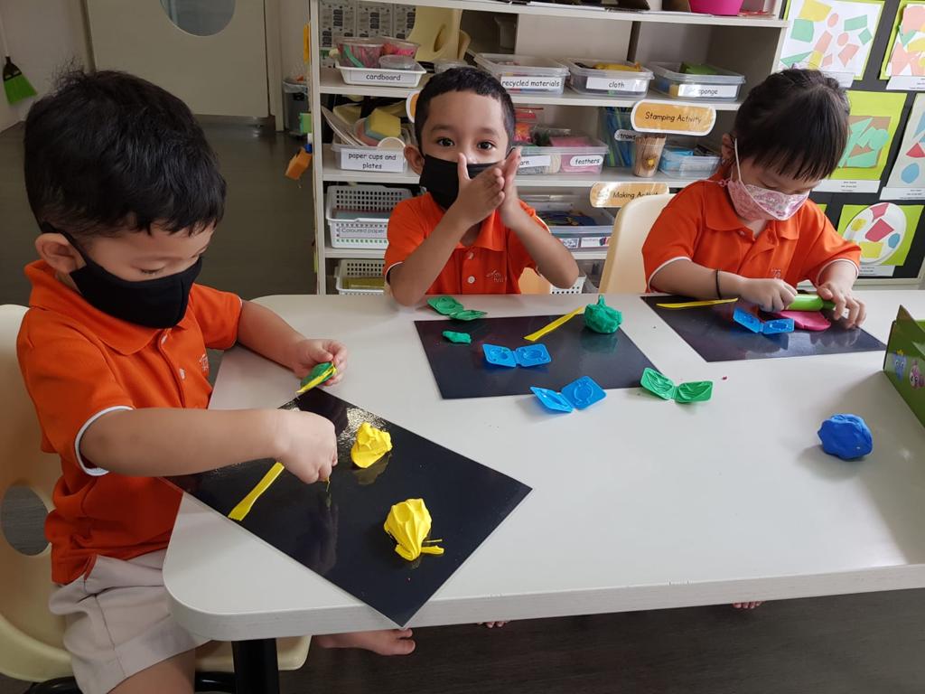 Children unleashing their creativity with the clay activity.
